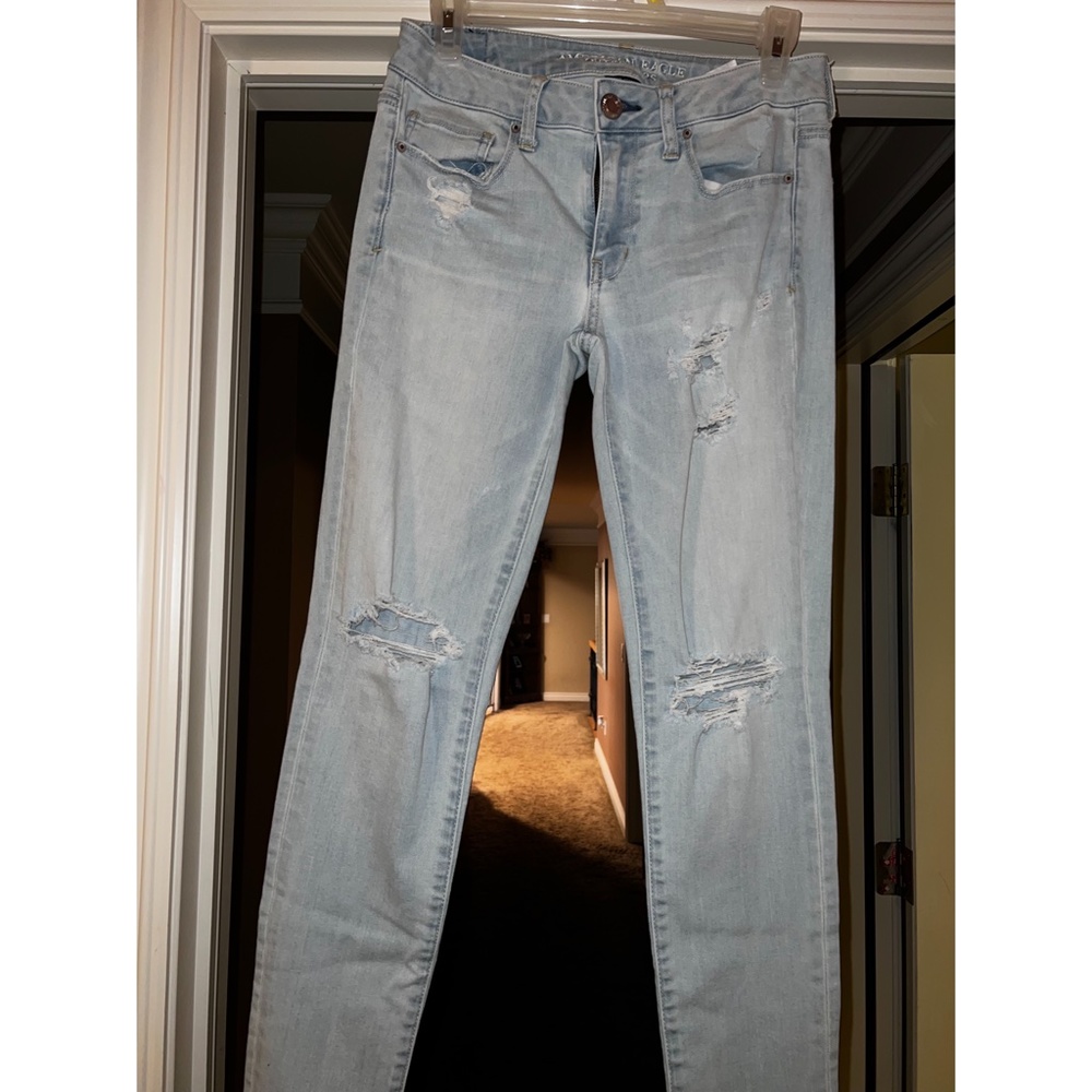 Light American Eagle Cut and Distressed Skinny Jeans